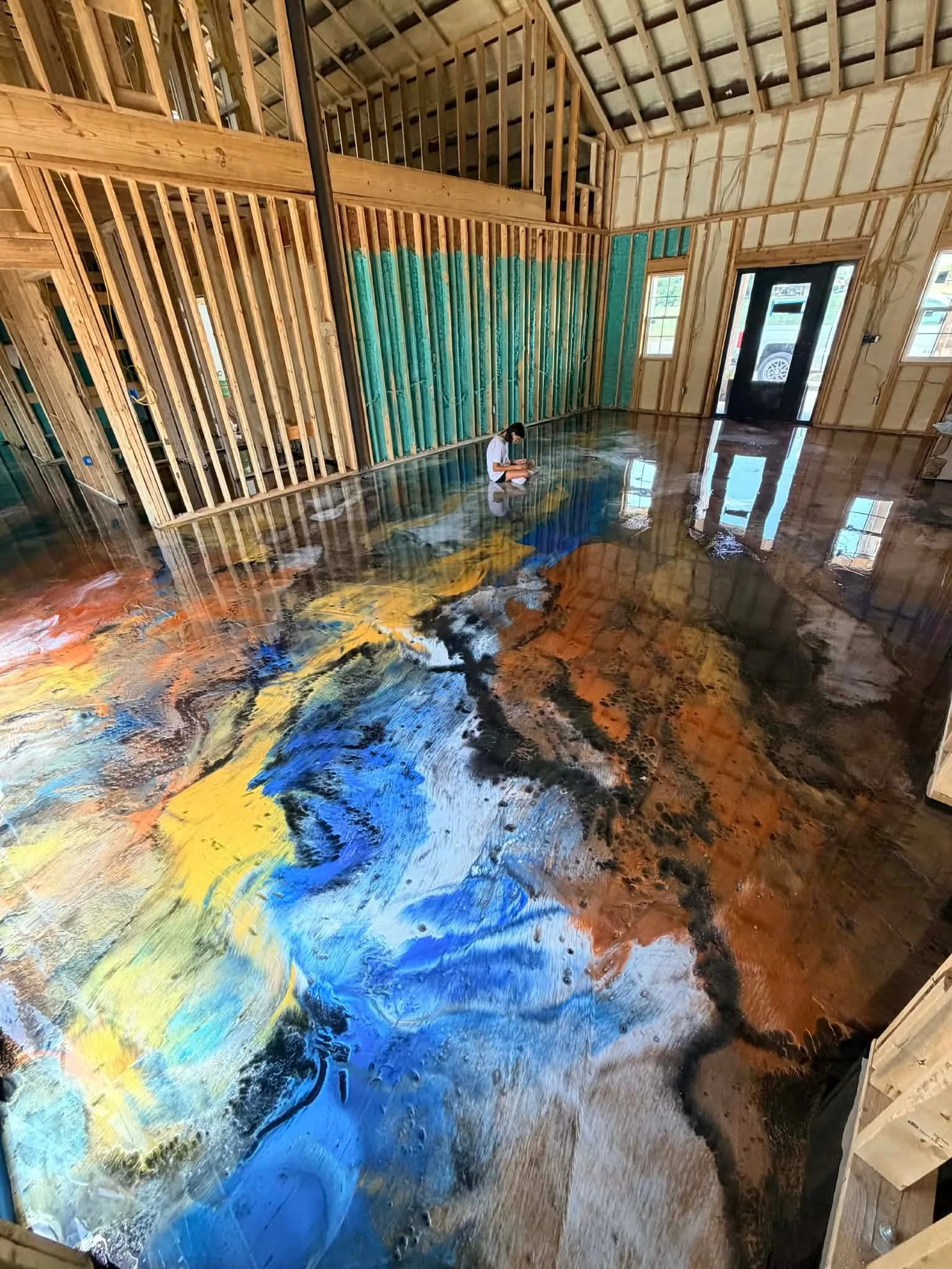 Long view across a newly finished metallic epoxy floor
